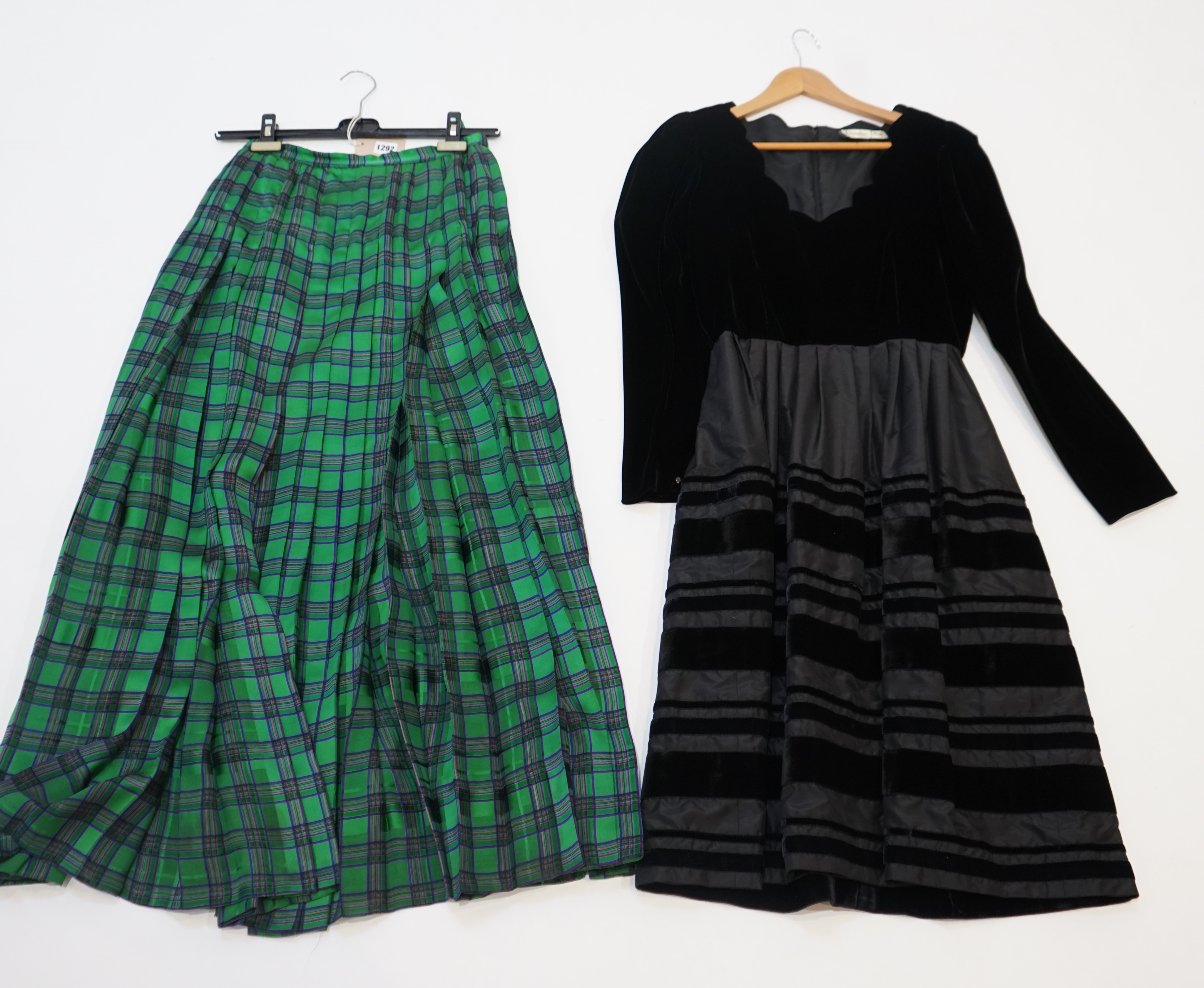 Christian Dior. A pleated long tartan pattern silk skirt, size ‘small/medium’ and a velvet and satin mid length evening dress, no size given, estimated at medium